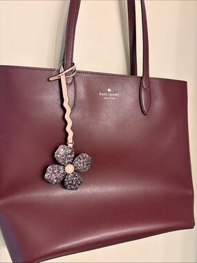 kate spade Burgundy Leather Tote with Pink Floral Charm